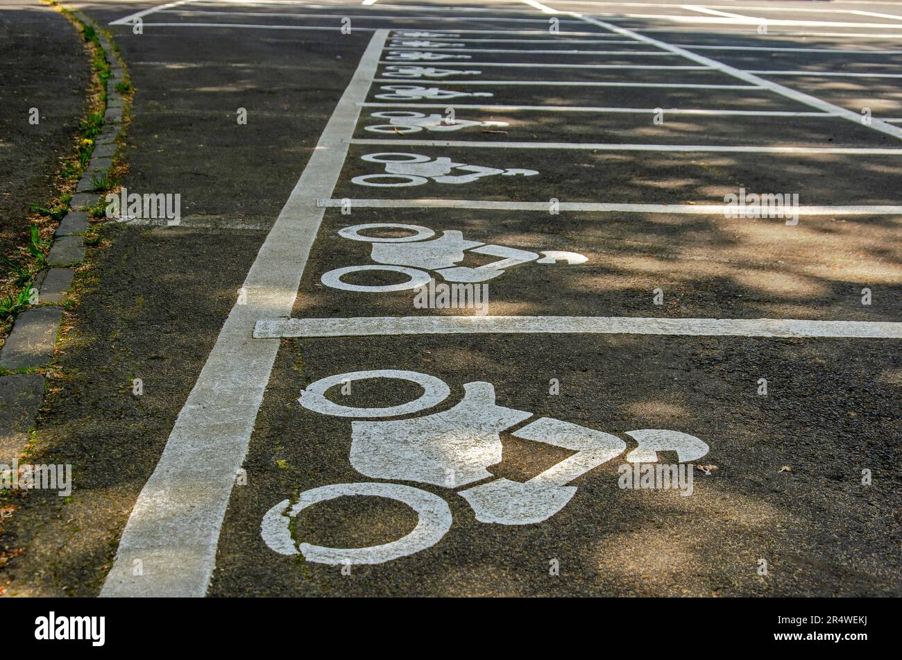 Daun, Germany, May 26, 2023: parking spaces for motorbikes on a parking lot near the crater lakes Stock Photo