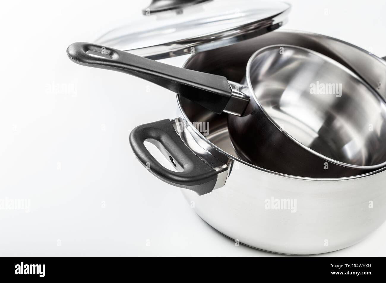 Stainless steel pots and pans isolated on white Stock Photo Alamy