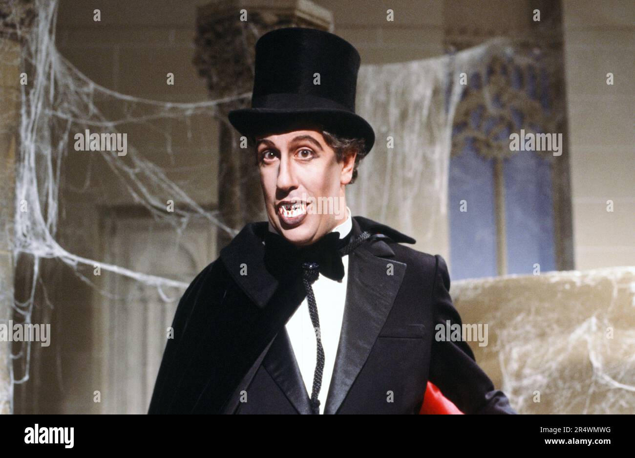 Stéphane Collaro dressed as a vampire for a sketch in the comedy TV show 'Cocoricocoboy' in 1986. Stock Photo