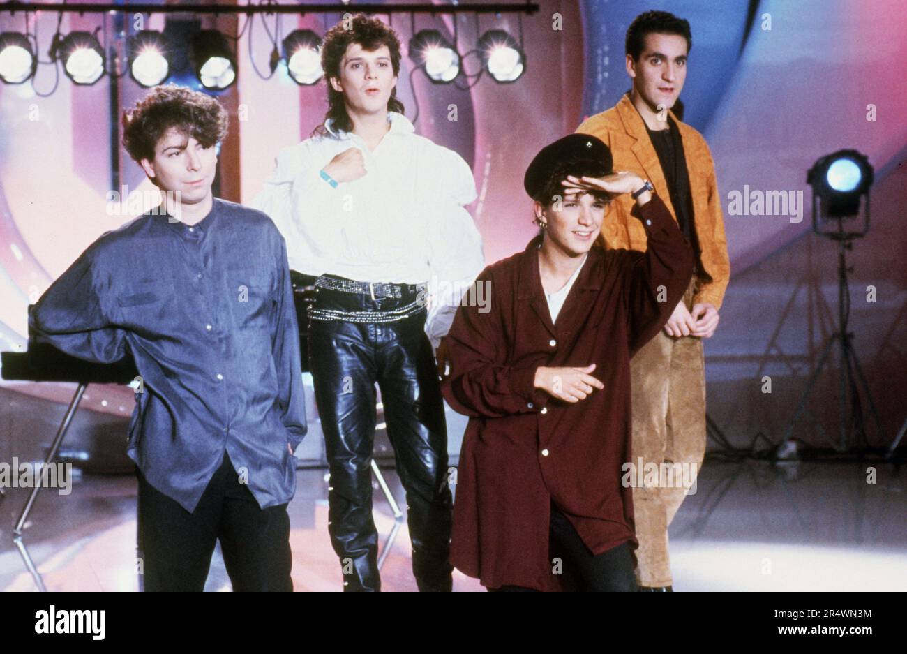 The band Indochine (Dominique Nicolas, Stéphane Sirkis, Nicola Sirkis, Dimitri Bodianski) on the set of the TV show 'La nouvelle affiche', on FR3 channel.  November 5, 1986 Stock Photo