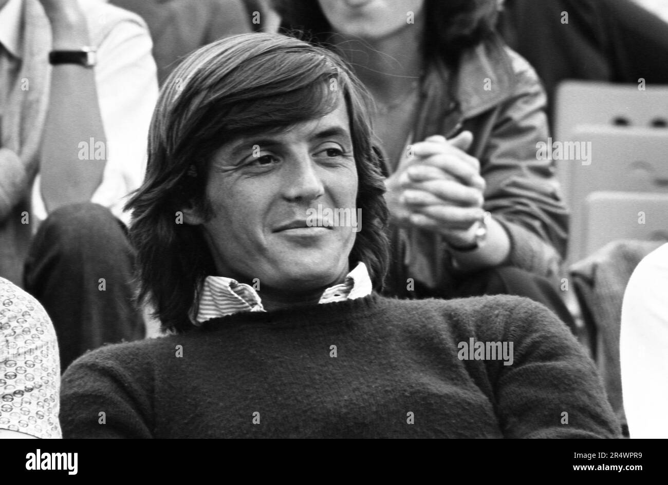 Portrait of Italian tennis player Adriano Panatta in the stands of the French Open in May 1979. Stock Photo