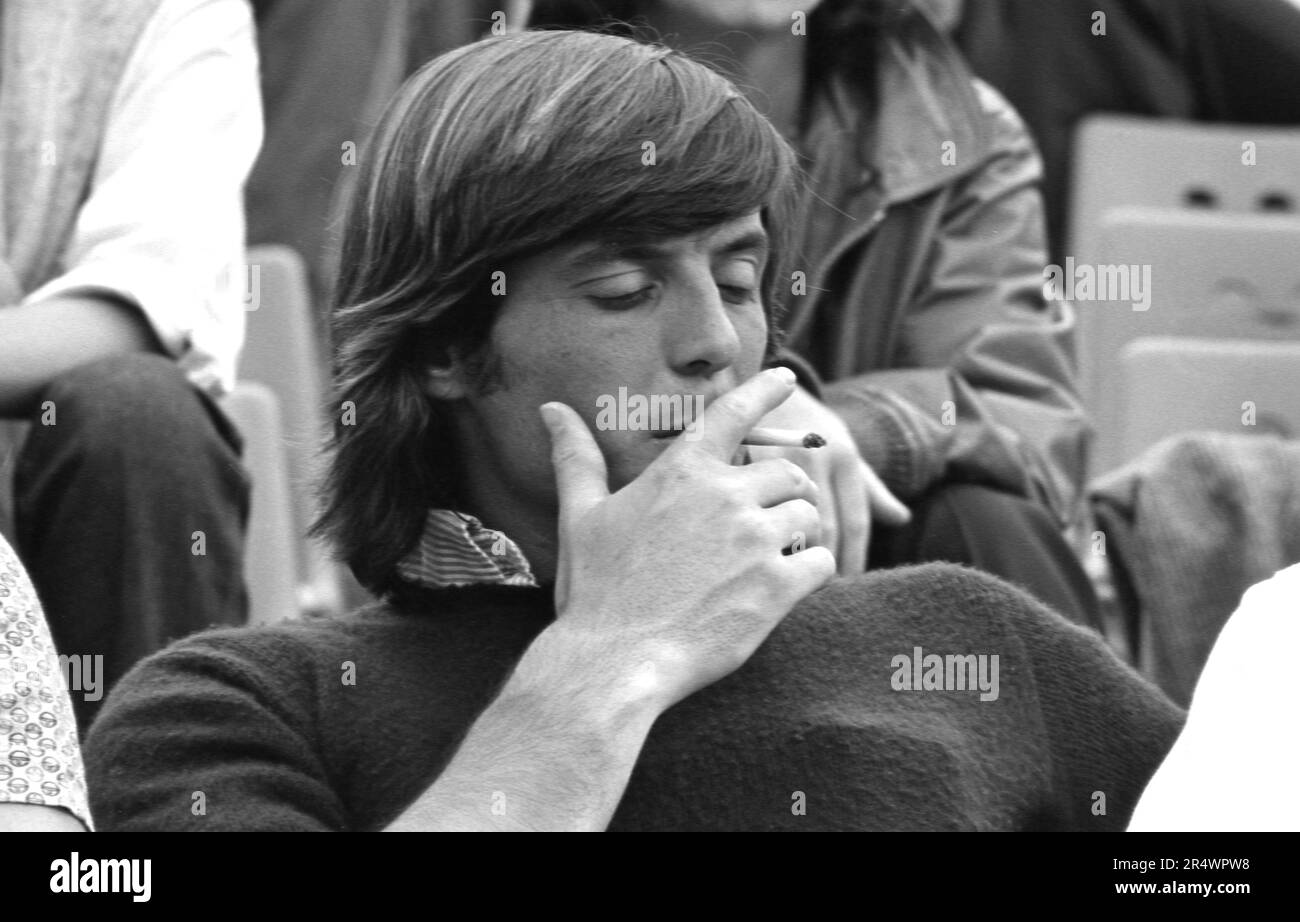 Portrait of Italian tennis player Adriano Panatta in the stands of the French Open in May 1979. Stock Photo