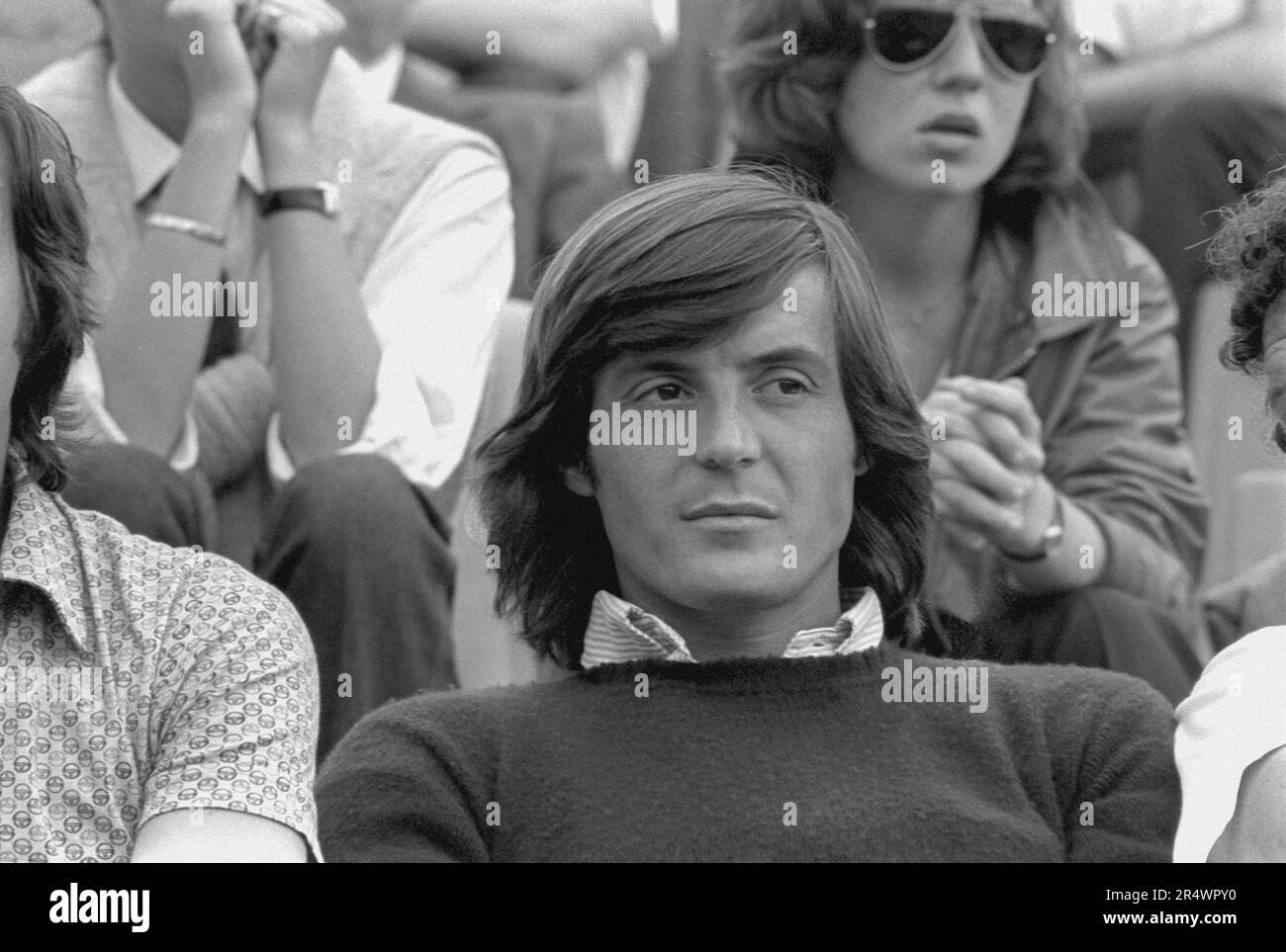 Portrait of Italian tennis player Adriano Panatta in the stands of the ...