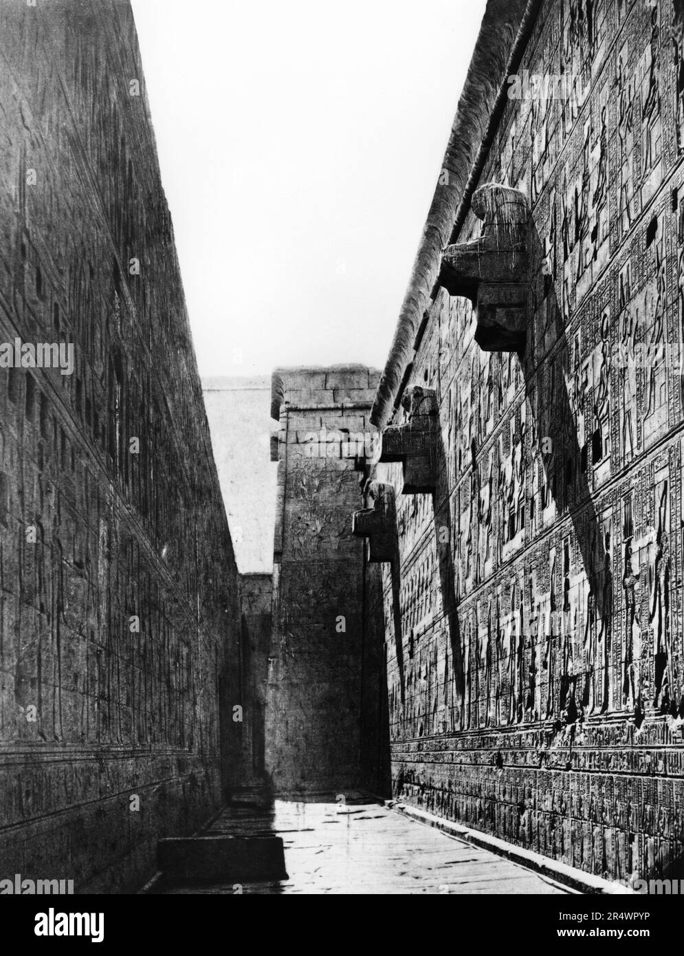 Temple of Edfu, dedicated to the  Ancient Egyptian falcon-headed god Horus. Photographed in 1860s during work of Auguste Mariette-Bey (1821-1881) French archaeologist and founder of the Egyptian Museum, Cairo in 1863. Stock Photo