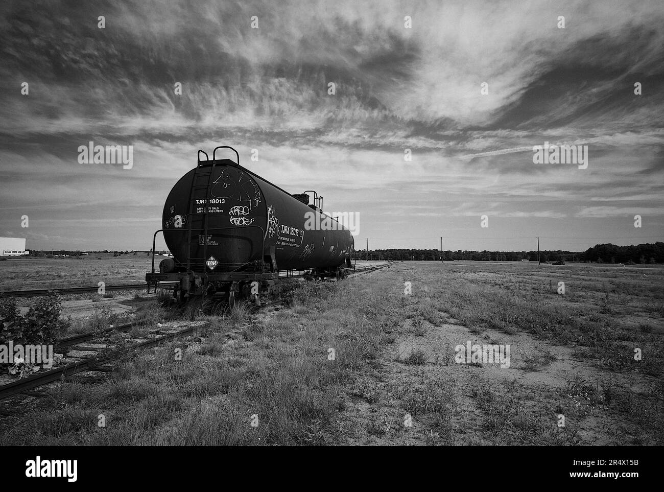 Big sky with tank car Stock Photo - Alamy