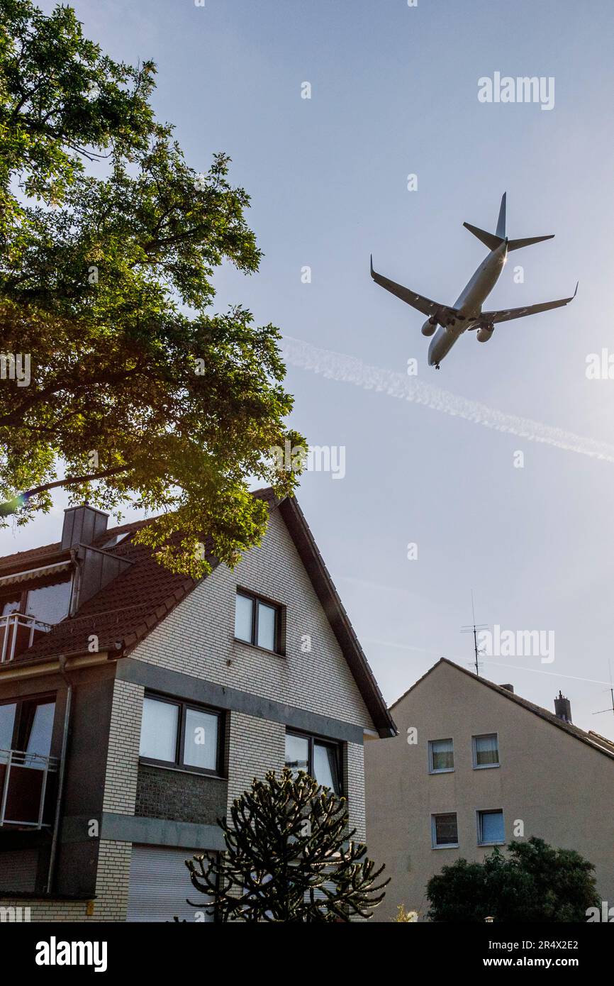 Entry lane over residential areas at Düsseldorf Airport Stock Photo