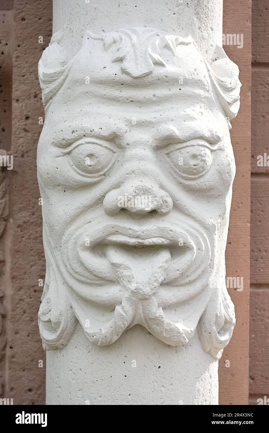 Baroque column with grimace face Stock Photo