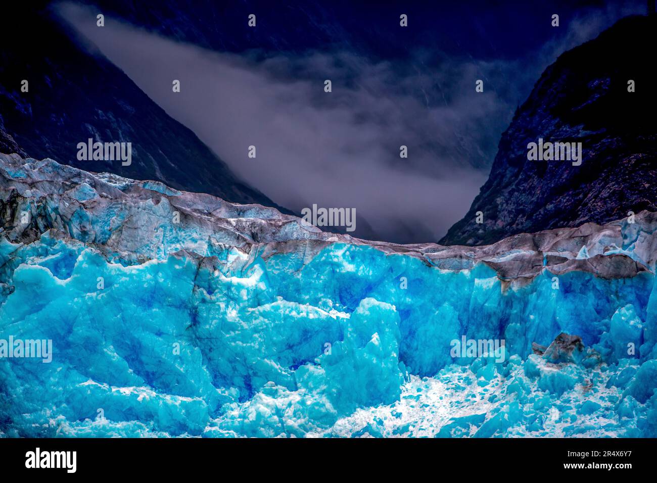 Glacier ice and mountains in southeastern Alaska. Stock Photo