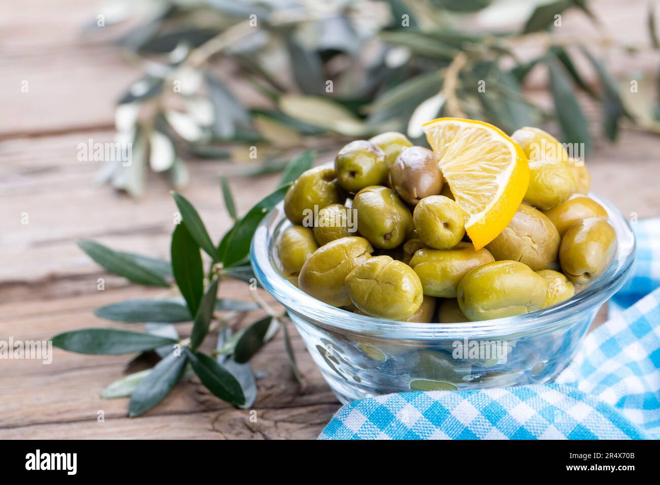 Cracked green olives. Cracked green olives with lemon. Turkish style