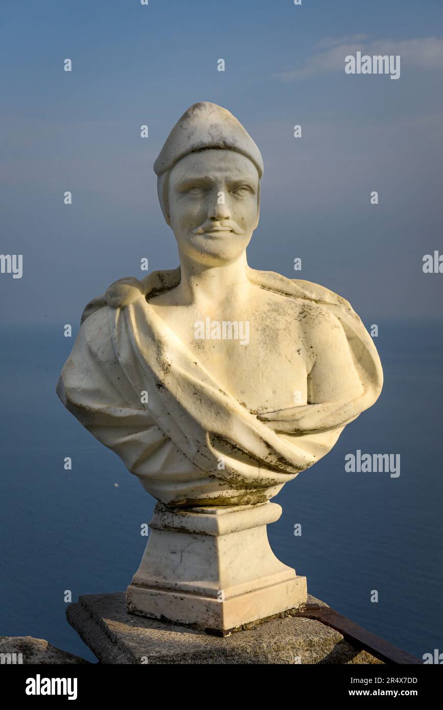 Close-up of a marble bust with ocean background along The Terrace of Infinity at Villa Cimbrone; Ravello, Salerno, Italy Stock Photo