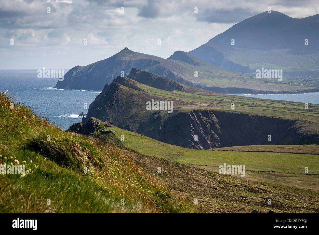 View From Sybil Head of the Three Sisters mountain peaks along the Atlantic Coast on Dingle Peninsula; County Kerry, Ireland Stock Photo