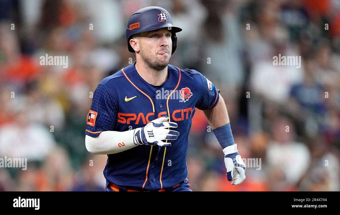 Houston Astros' Alex Bregman runs up the first base line against