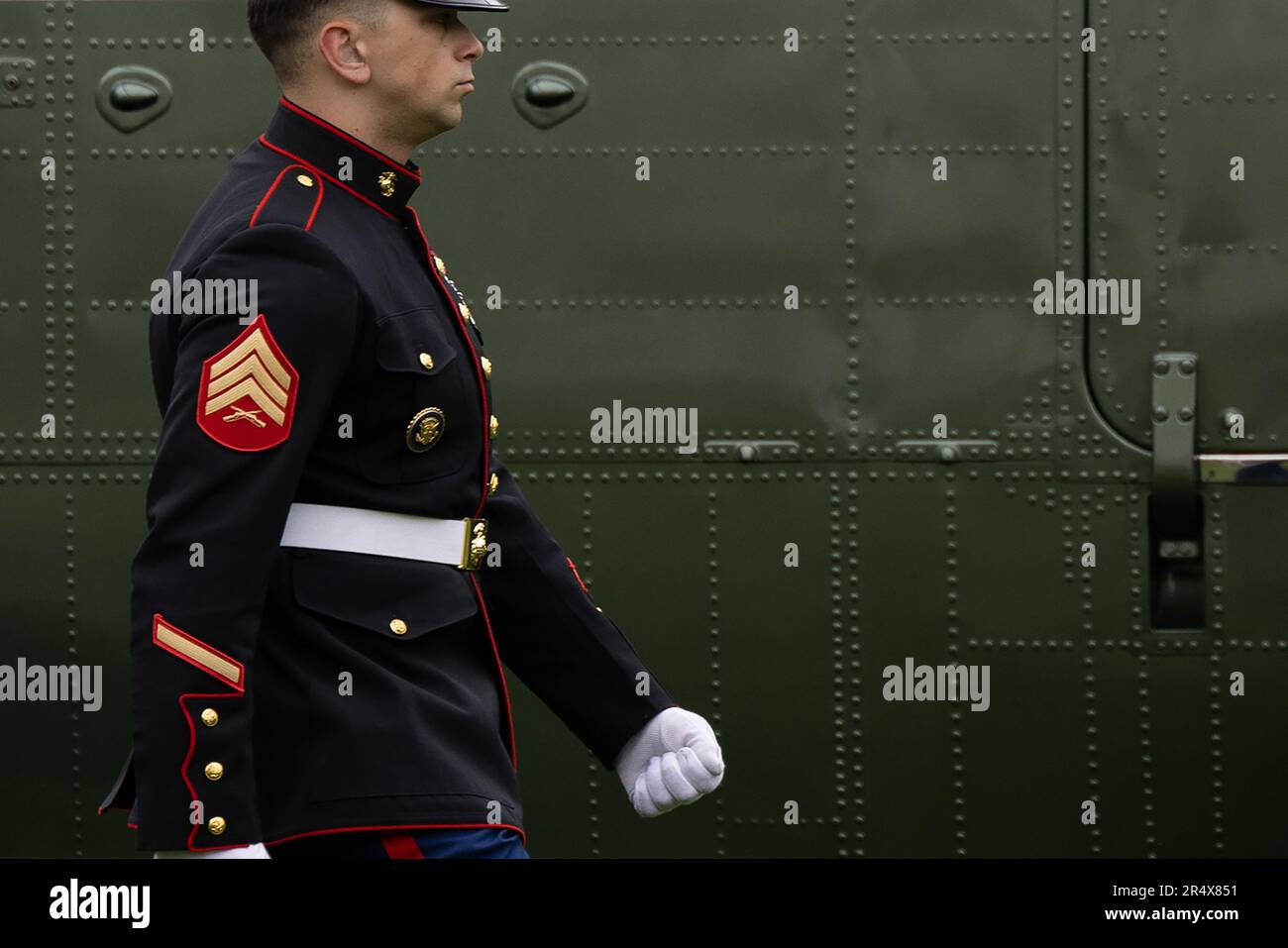 Washington, United States Of America. 30th May, 2023. A marine walks to open a door on Marine One, carrying United States President Joe Biden and first lady Dr. Jill Biden, at the White House in Washington, DC, Tuesday, May. 30, 2023. Credit: Julia Nikhinson/Pool/Sipa USA Credit: Sipa USA/Alamy Live News Stock Photo