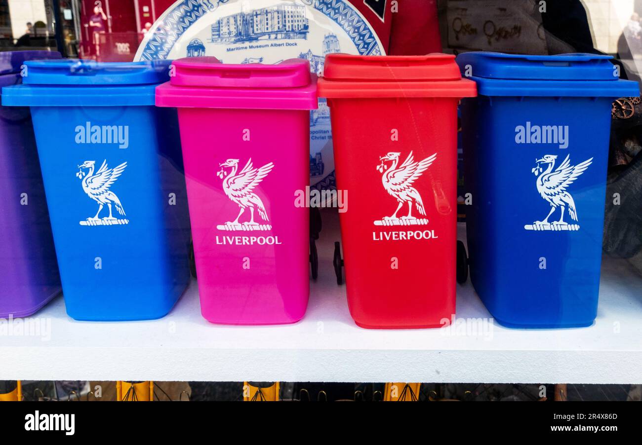 Small containers with Liver Bird illustration in window of Liverpool shop Stock Photo