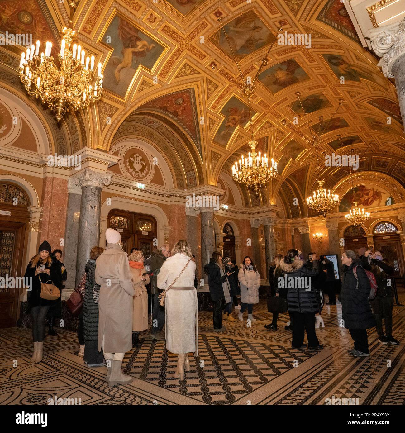 Budapest, Hungary - November 28th, 2022: Audience in the foyer of the Hungarian State Opera House, Budapest, Hungary. Stock Photo
