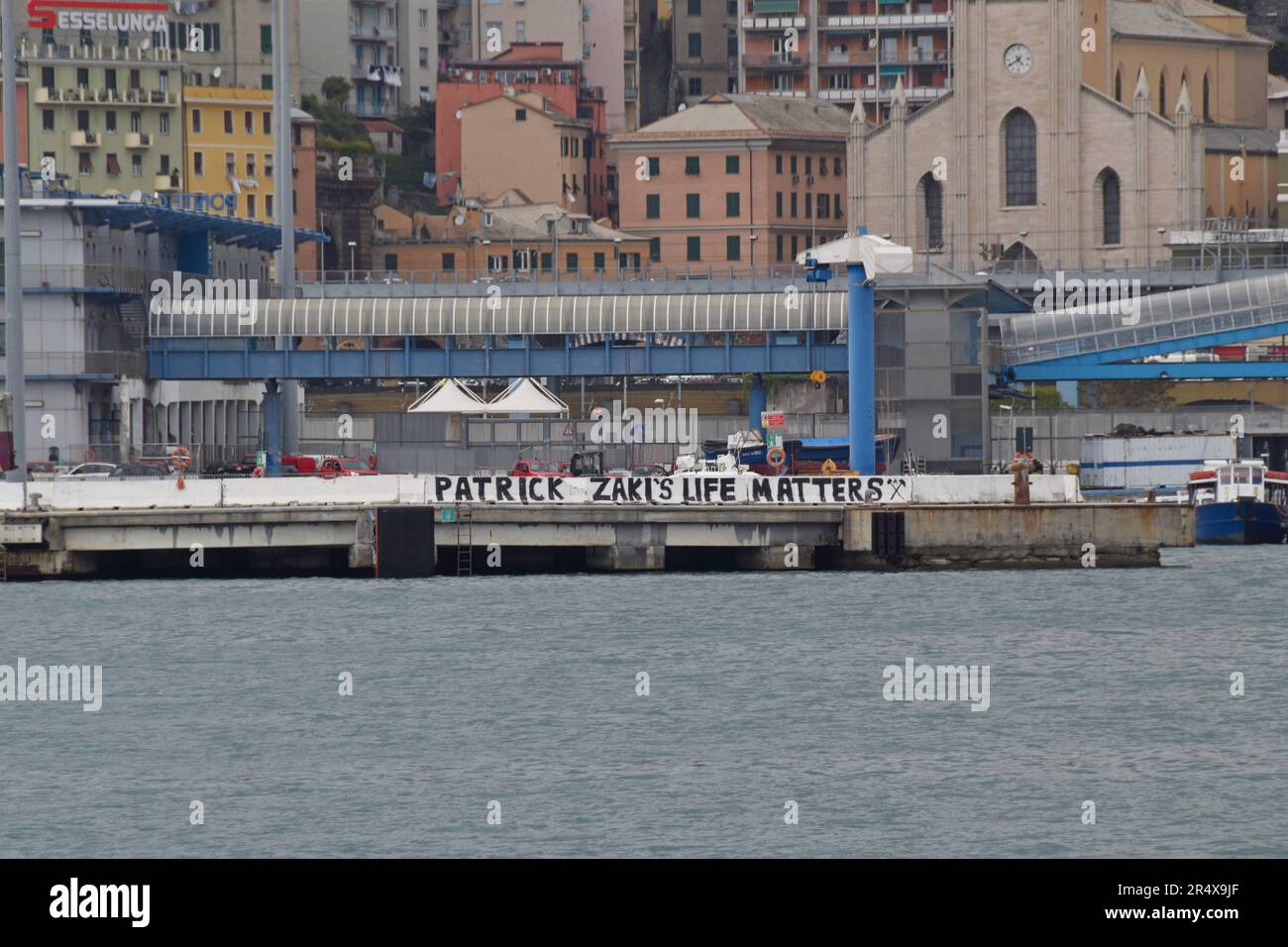 A banner in Genoa Port supporting Patrick Zaki, Egyptian  human rights campaigner & student in Italy, who was arrested and tortured by Egyptian police Stock Photo