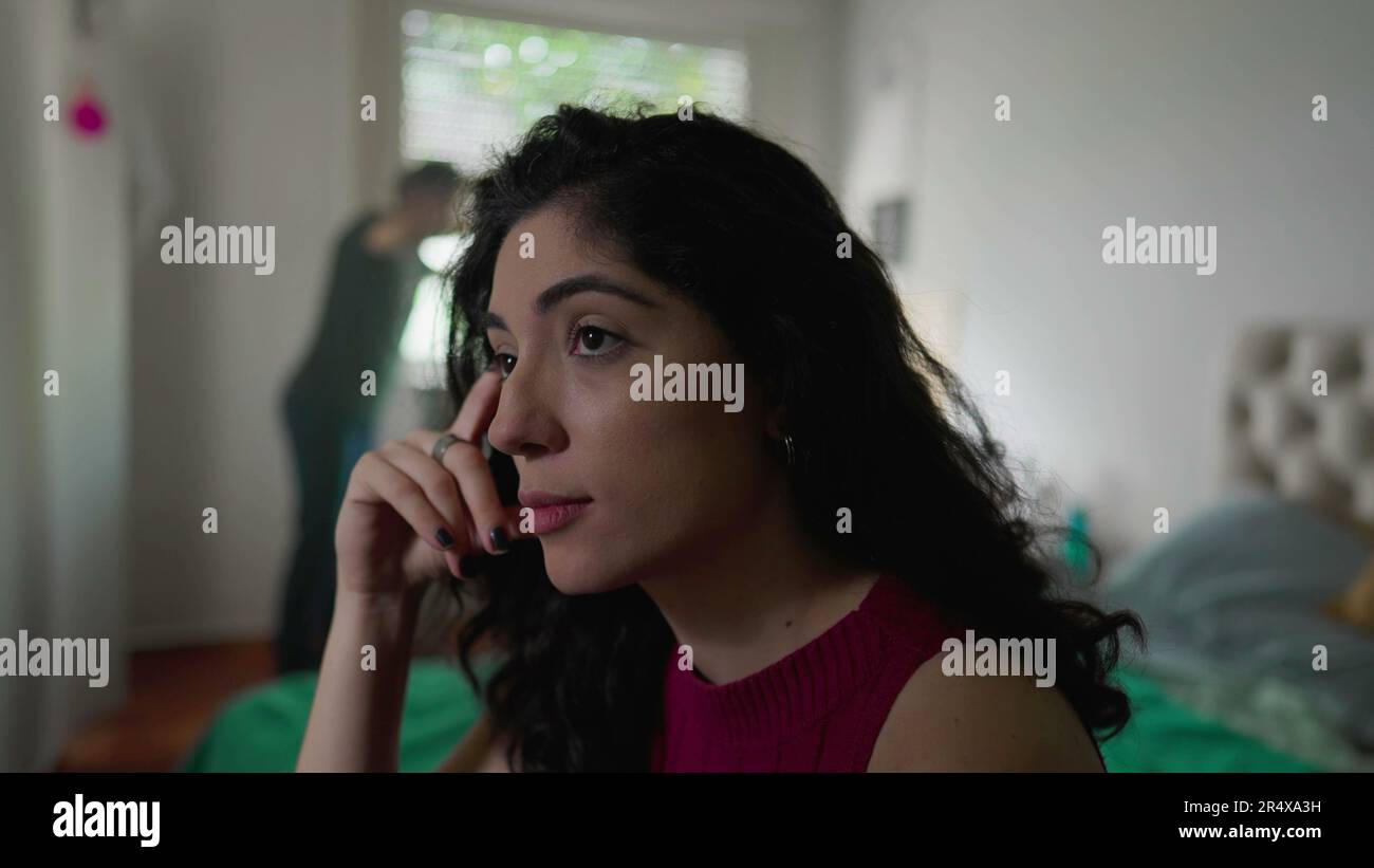 Couple in crisis Young woman rolling eyes listening to male partner