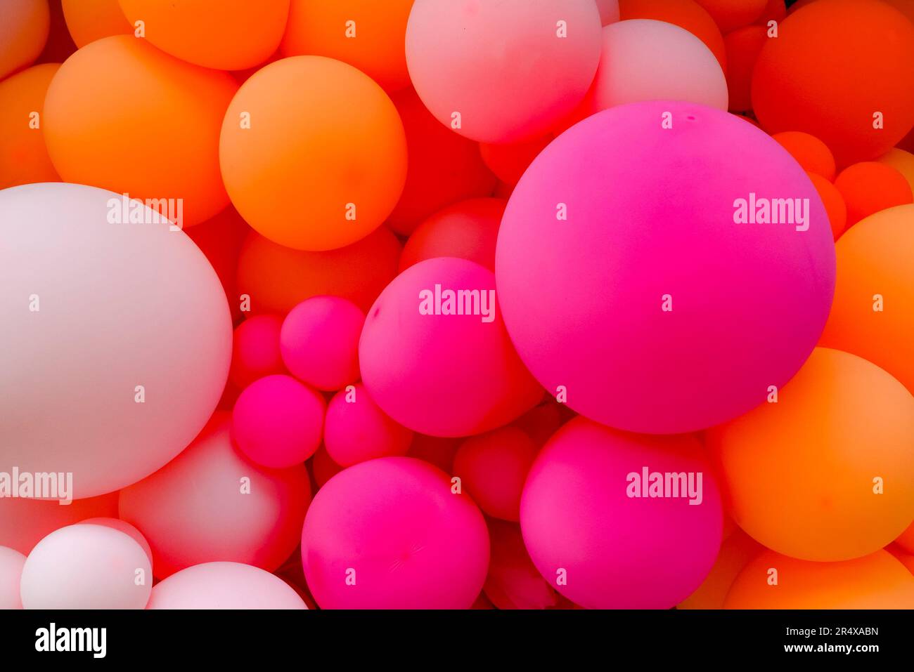 Pink and orange balloons Stock Photo Alamy
