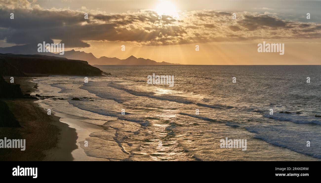 Sunset panorama at surfer beach Playa del Viejo Rey, La Pared, Fuerteventura Stock Photo