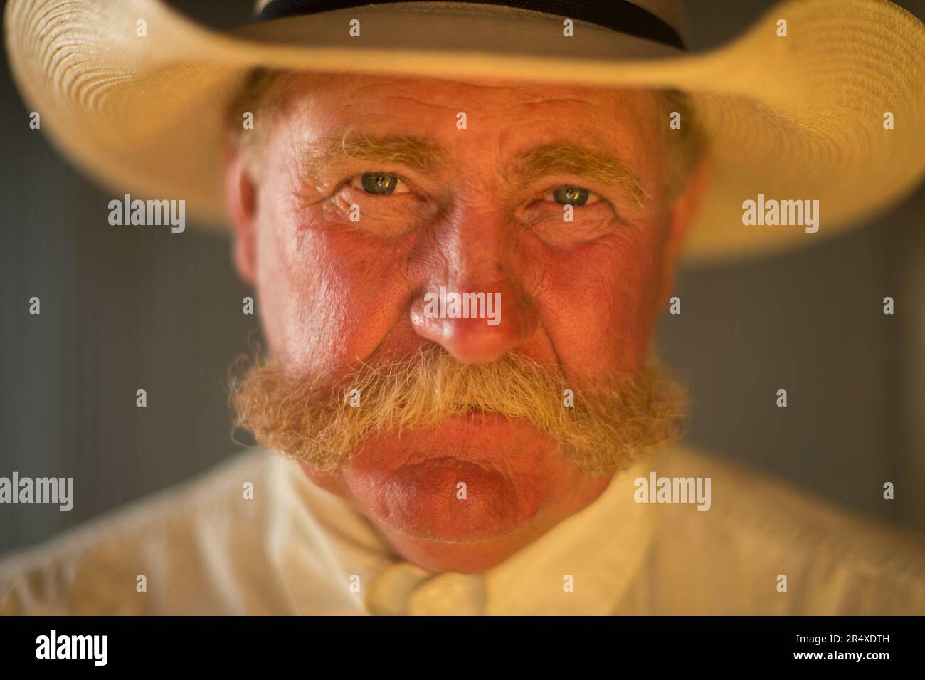 Portrait of a rancher wearing a cowboy hat; Burwell, Nebraska, United States of America Stock Photo