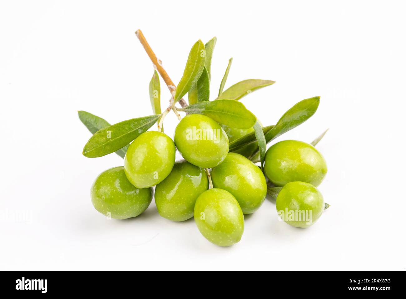 Fresh green olives on the white background Stock Photo - Alamy