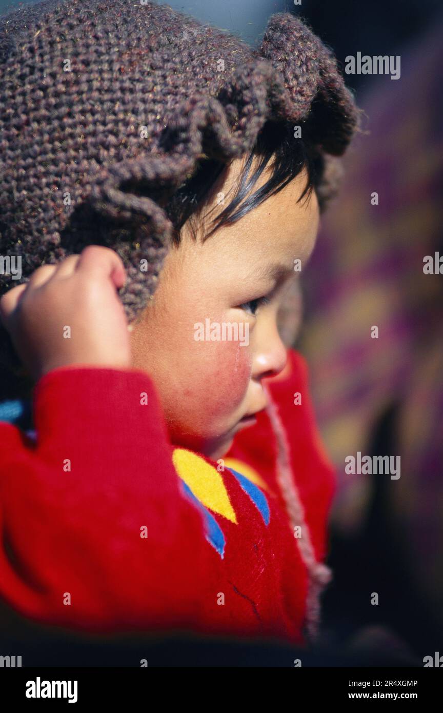 A profile portrait of a child in Thimphu, Bhutan. Stock Photo