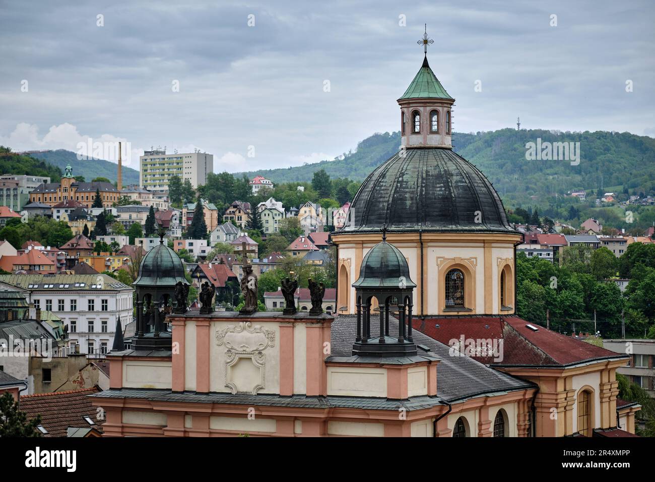 High view of Decin (Tetschen), Czech Republic. Old villas, baroque buildings, churches and communist-built panel block of flats. Tourist destination. Stock Photo