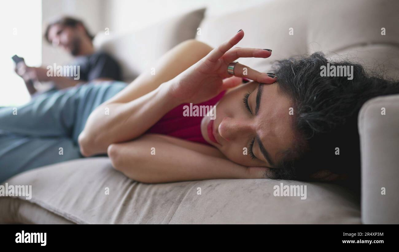 Preoccupied Images Preoccupied Woman Lying on the Couch with a Fatigued Expression while ...