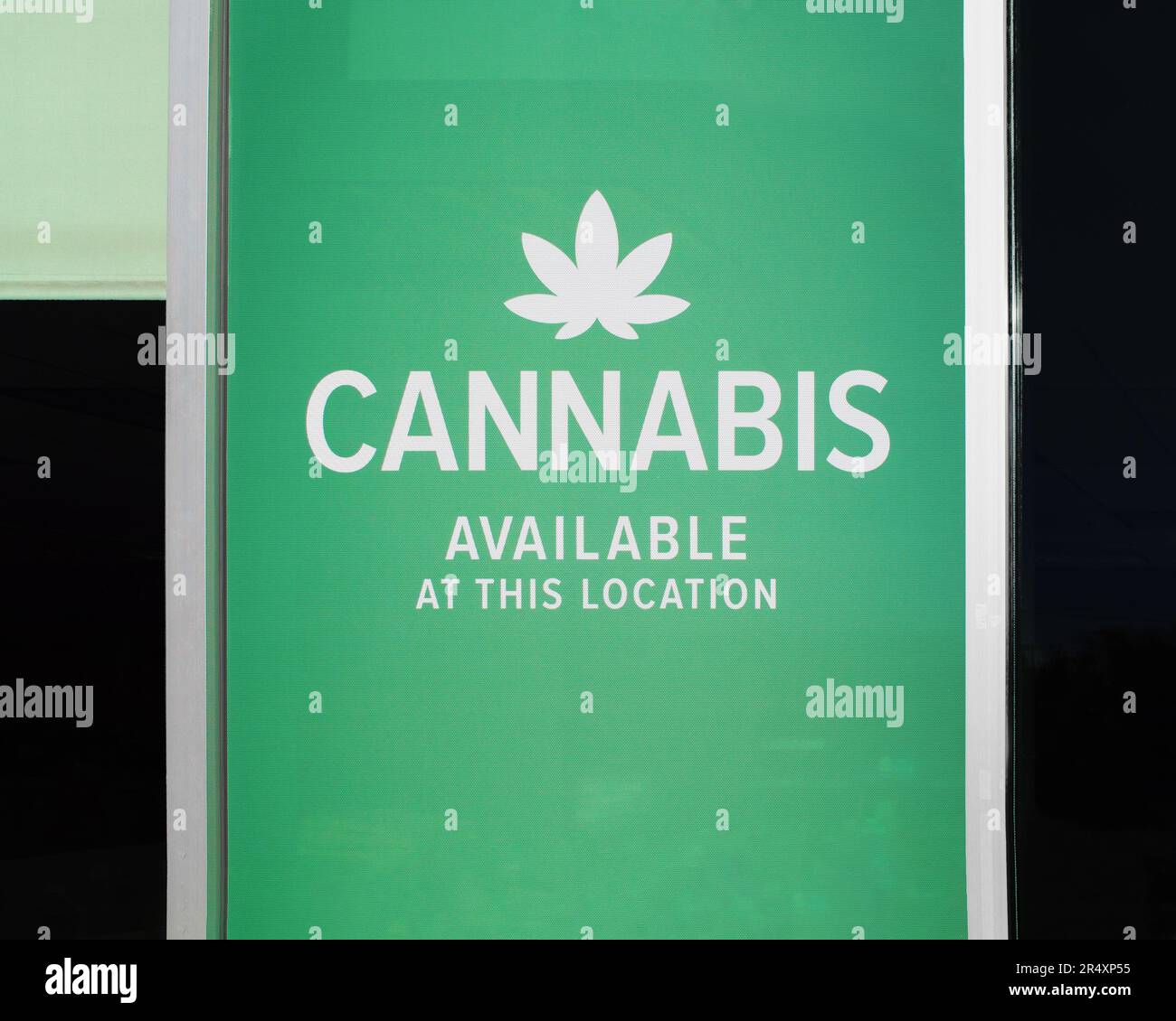 Cannabis available sign on building facade Stock Photo