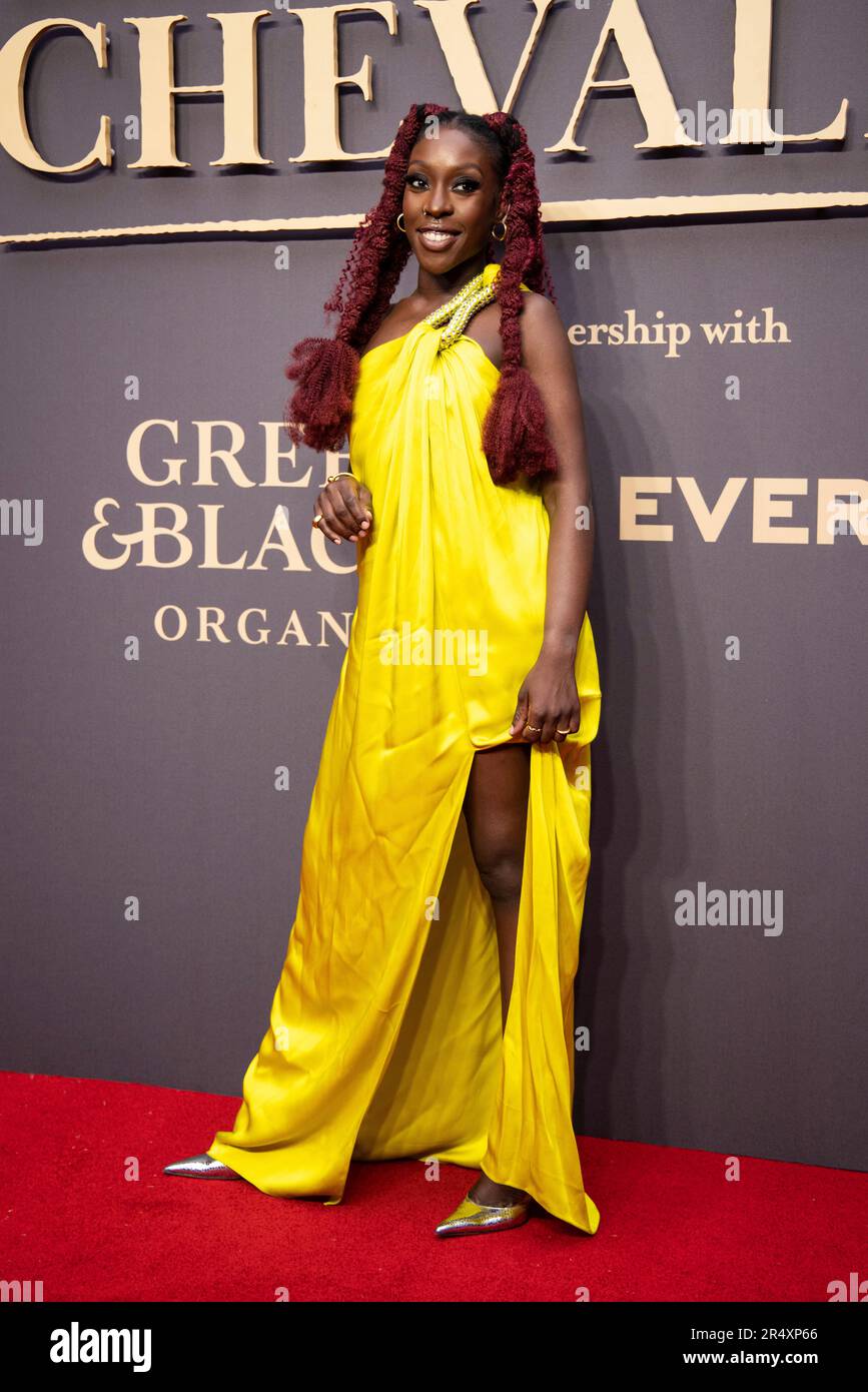 Ronke Adekoluejo poses for photographers upon arrival at the premiere