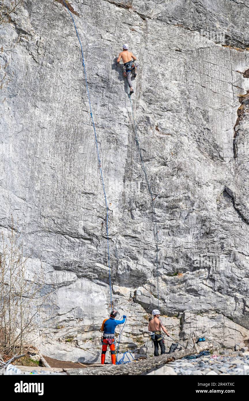 Banff National Park, Alberta, Canada May 06, 2023 Three men engage