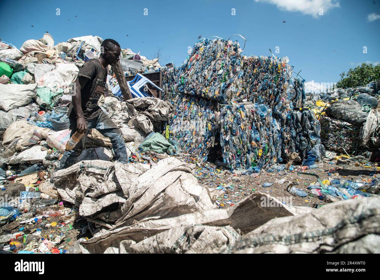 A worker is seen at a plastic recycling plant in Nakuru. Negotiators have gathered in Paris, France for the second round of deliberations to develop a global treaty aimed at tackling the escalating issue of plastic pollution. According to a recent report by the United Nations Environment Programme (UNEP), countries have the potential to reduce plastic pollution by 80% by 2040 by eliminating unnecessary plastics, implementing recycling and reuse strategies, introducing deposit return schemes, and substituting plastic with sustainable alternative materials. (Photo by James Wakibia/SOPA Images/ Stock Photo
