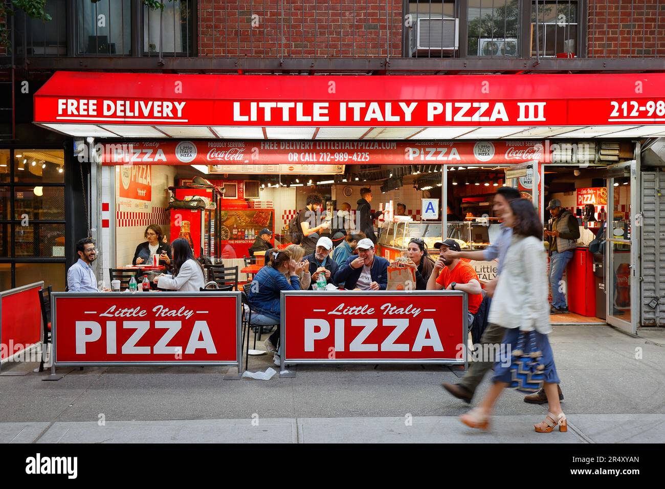 Little Italy Pizza III, 122 University Pl, New York, NYC storefront of a pizza chain store in Manhattan's Union Square. Stock Photo