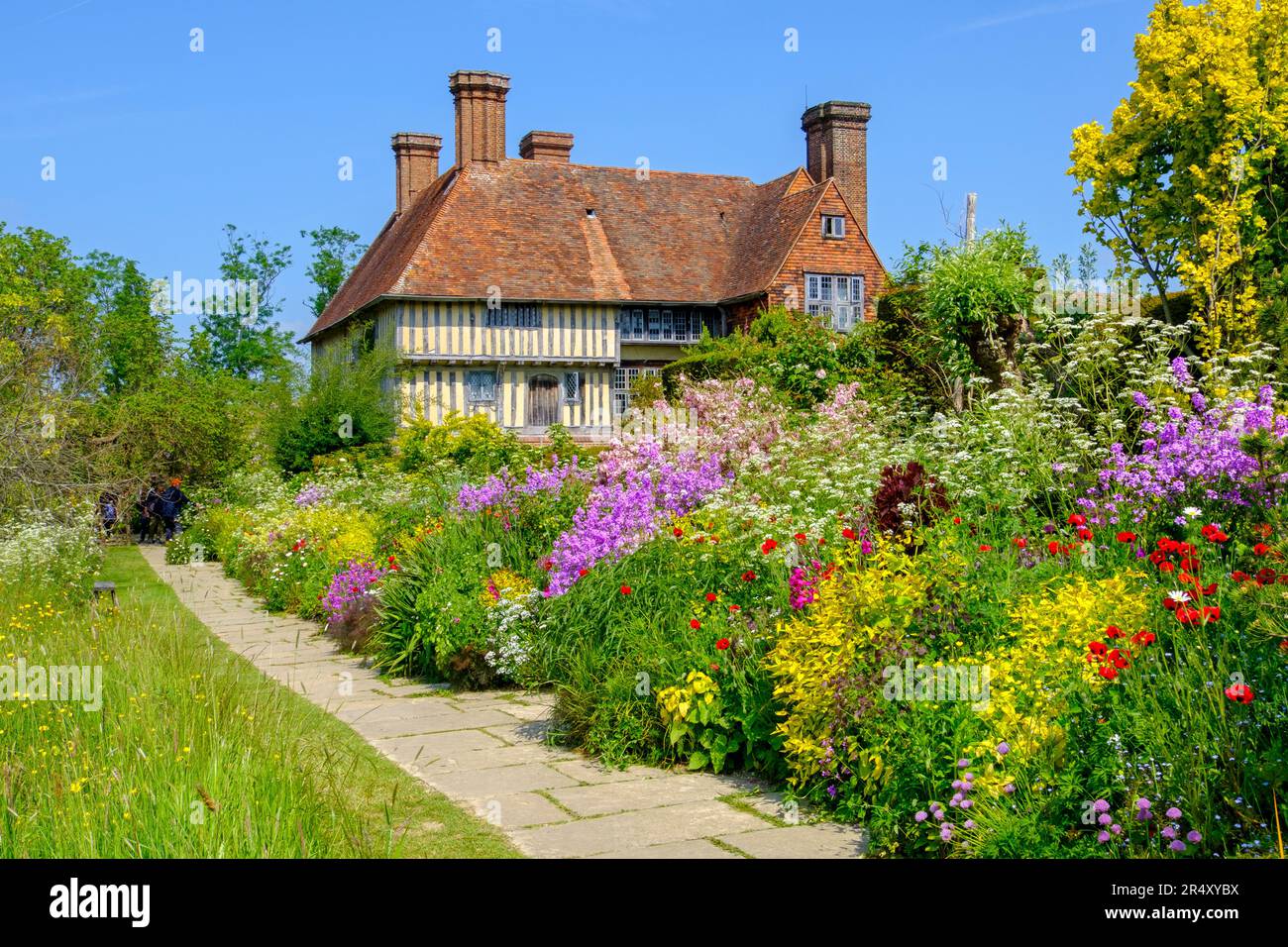 Great Dixter house and garden, the long border in spring, East Sussex