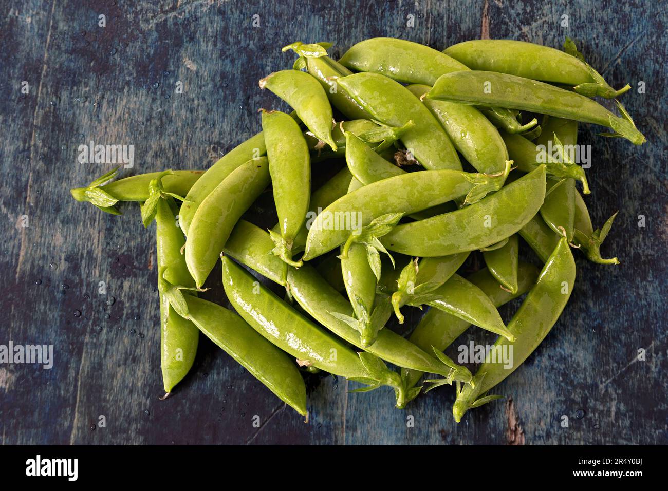Fresh green snap peas from the garden. Stock Photo