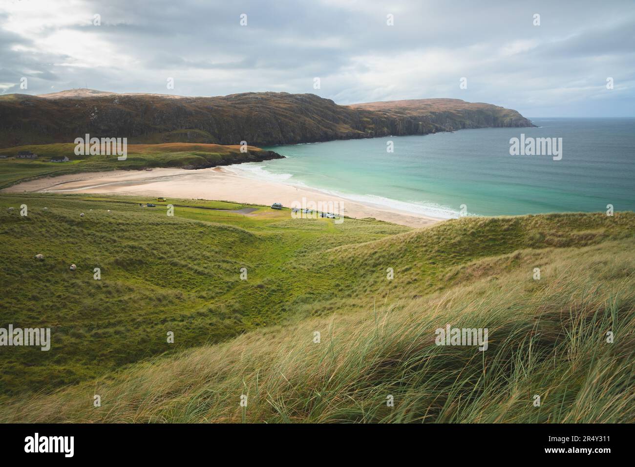 Beautiful seascape landscape over headland and sandy bay at Reef Beach on the Isle of Lewis and Harris in the Outer Hebrides of Scotland, UK. Stock Photo