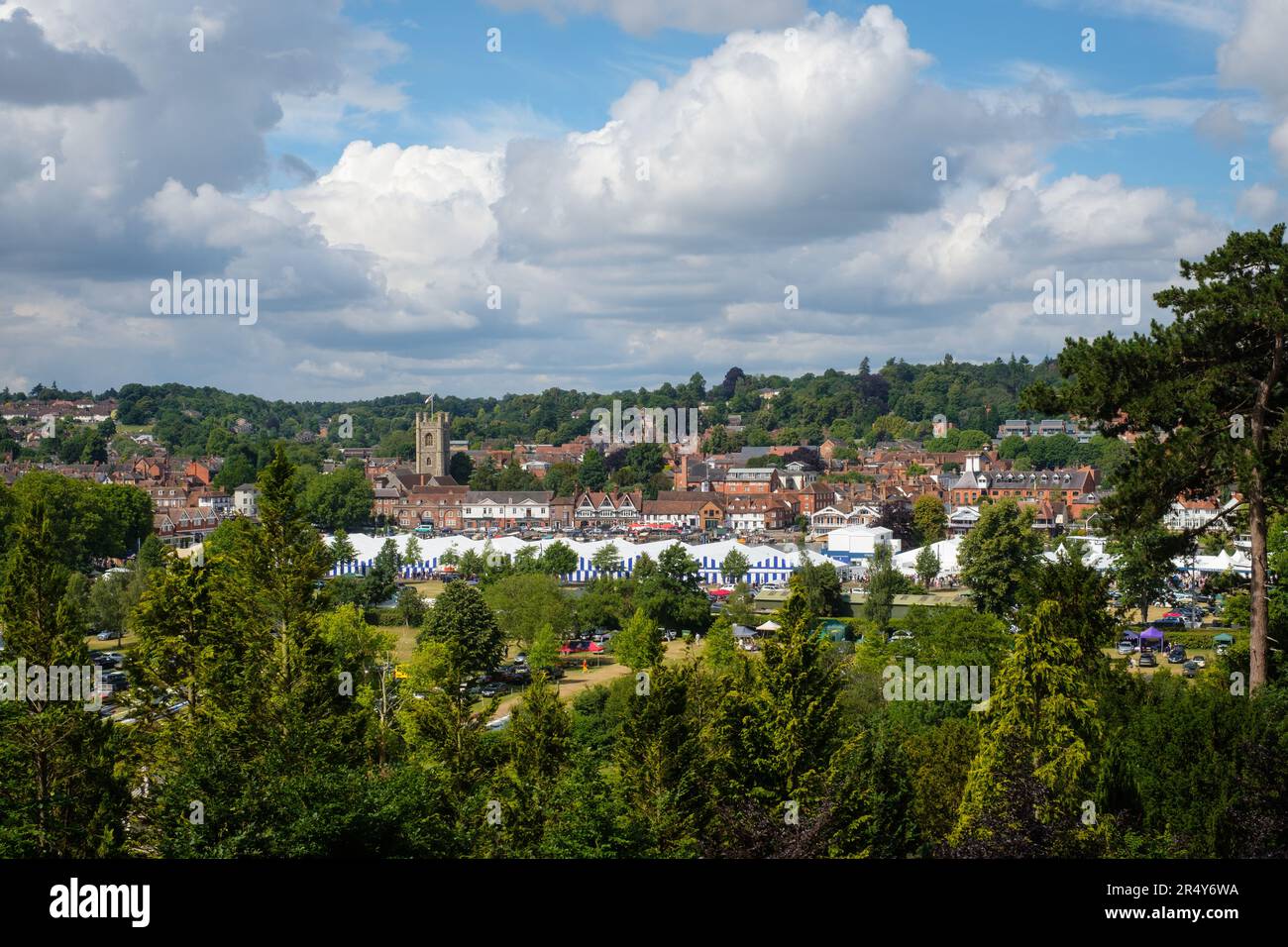 A view looking over Henley-on-Thames during the Henley Royal Regatta 2022 with St. Mary's Church and the colourful blue and white boat tents. Stock Photo