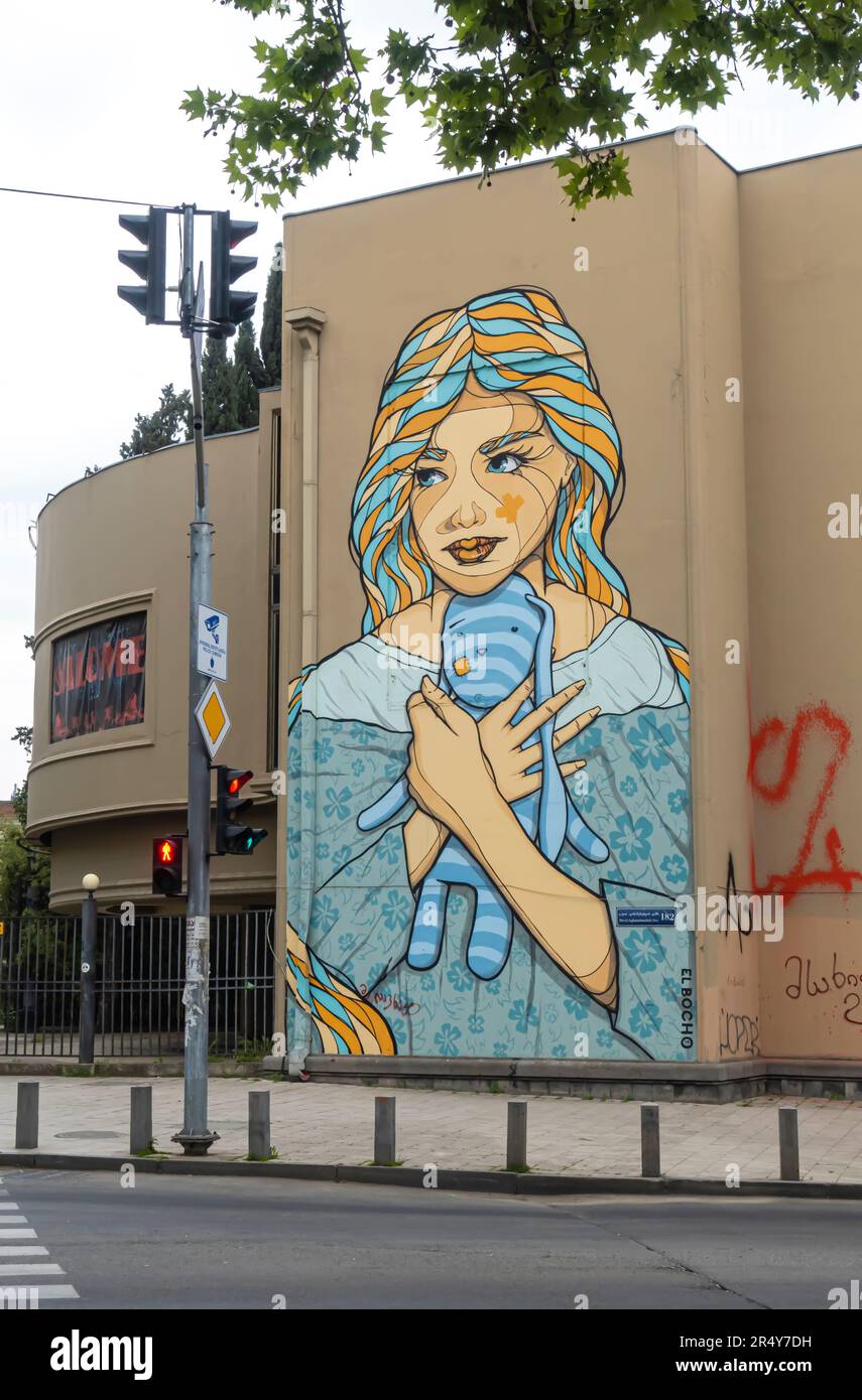 El Bocho mural Girl hugging her toy. Tbilisi Stock Photo Alamy