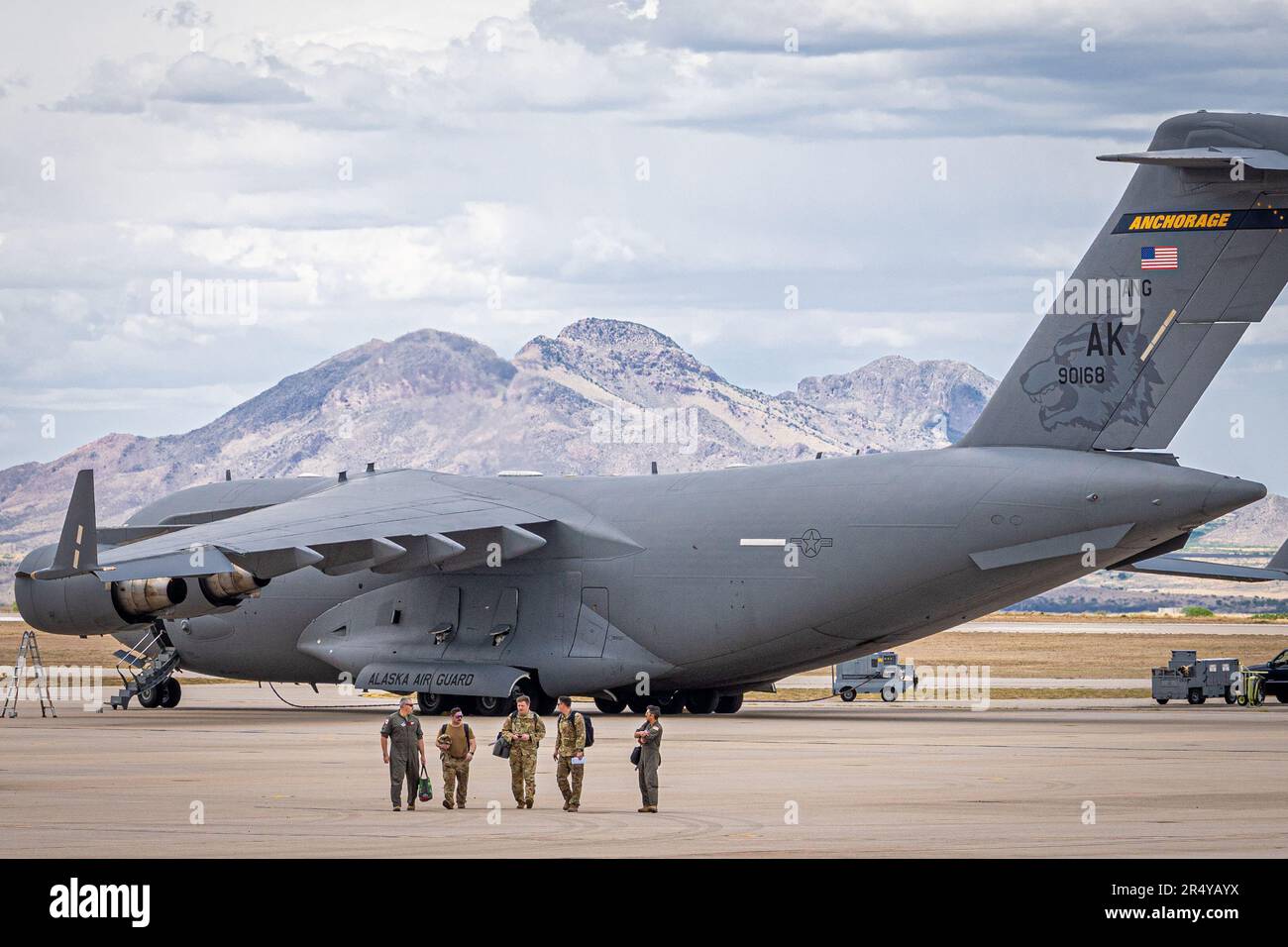 U.S. Air Force C-17 Globemaster III aircrew members assigned to the 517th Airlift Squadron, walk from their aircraft after a training sortie, while attending the Advanced Tactics Aircrew Course at Fort Huachuca, Arizona, May 18, 2023. Since 1983 the Advanced Airlift Tactics Training Center has provided advanced tactical training to airlift aircrews from the Air National Guard, Air Force Reserve Command, Air Mobility Command, U.S. Marine Corps and 17 allied nations. (U.S. Air Force photo by Master Sgt. Patrick Evenson) Stock Photo
