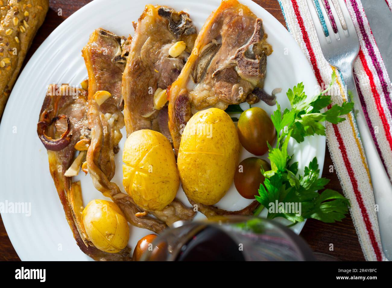 Roasted lamb ribs with potato Stock Photo