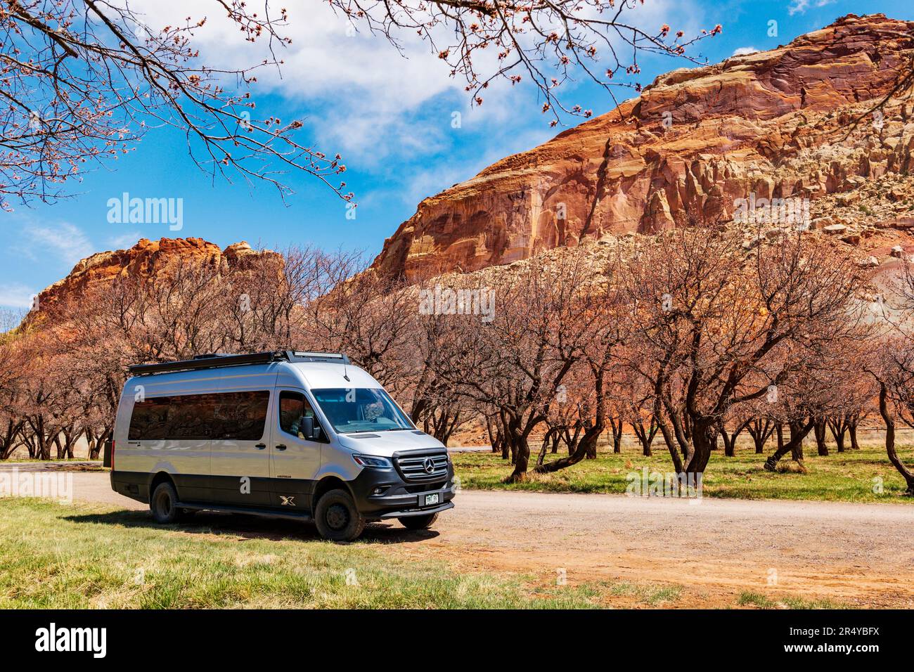 Airstream Interstate 24X 4WD campervan; Apricot orchard; Fuita; Capital Reef National Park; Utah; USA Stock Photo