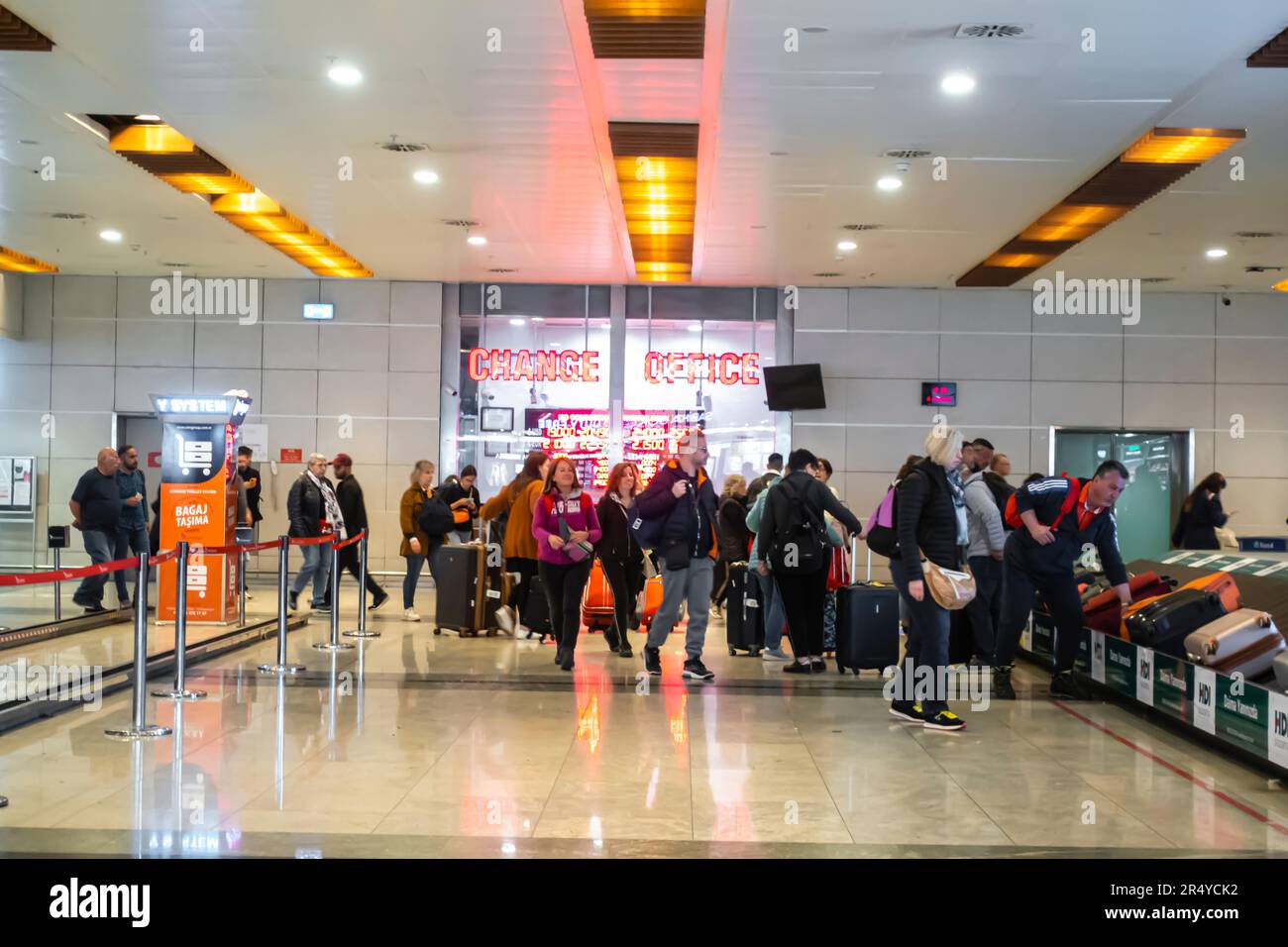 Passengers picking claiming buggage luggage, Sabiha Gokcen International Airport, Istanbul, Turkey Stock Photo