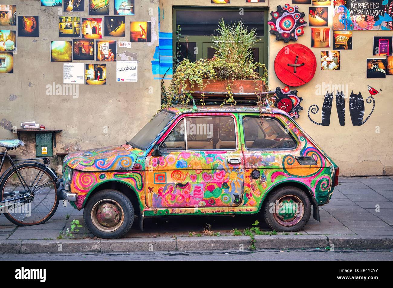 Krakow, Poland - October 21, 2012: Old Polish car Fiat 126 placed as a exhibit of local manufacture. Colorful car is part of the gallery, located on t Stock Photo