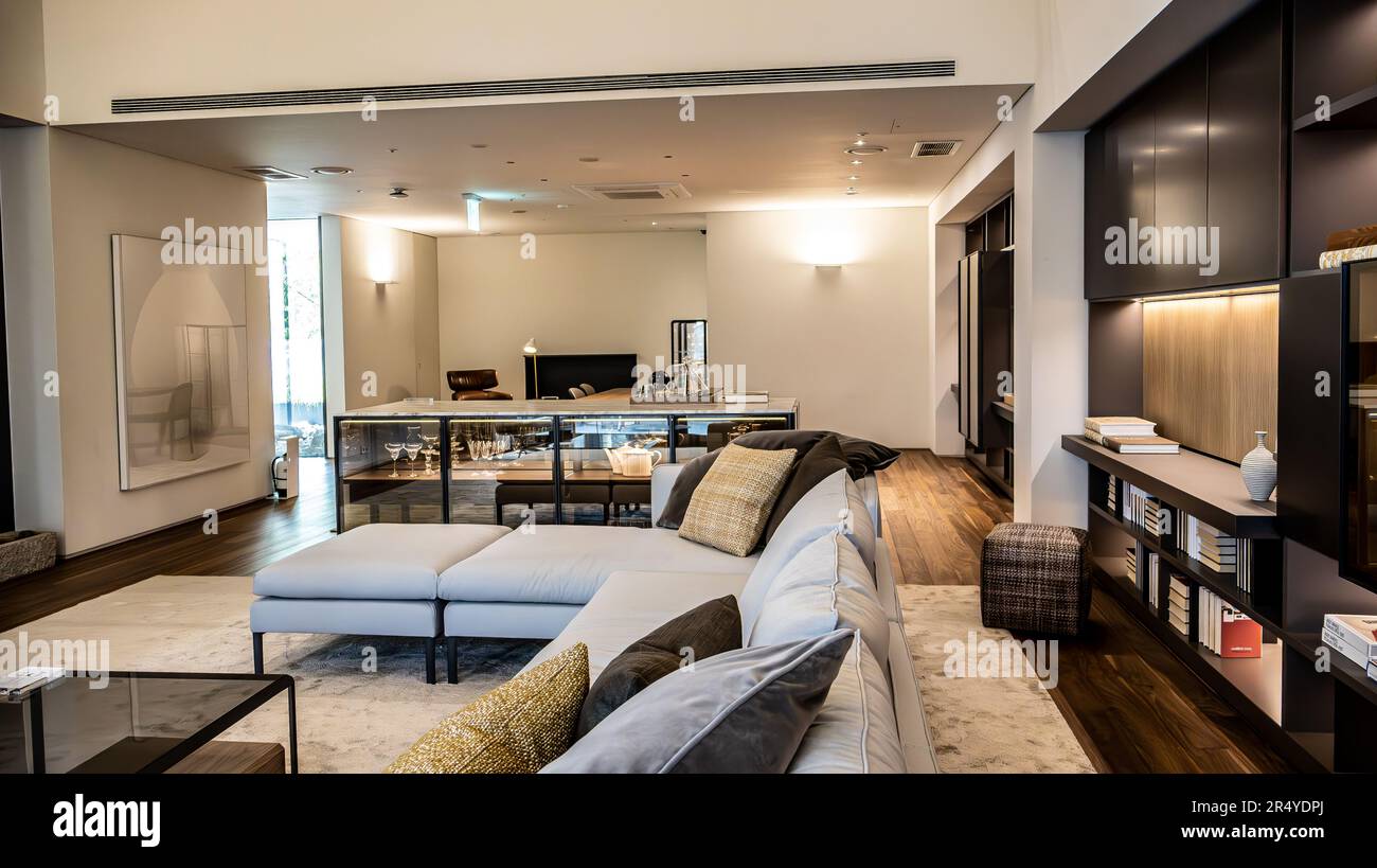 Grand Living Room with Spacious Sliding Glass Doors, Luxurious Sofas