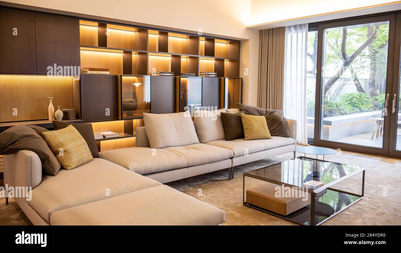 Grand Living Room with Spacious Sliding Glass Doors, Luxurious Sofas