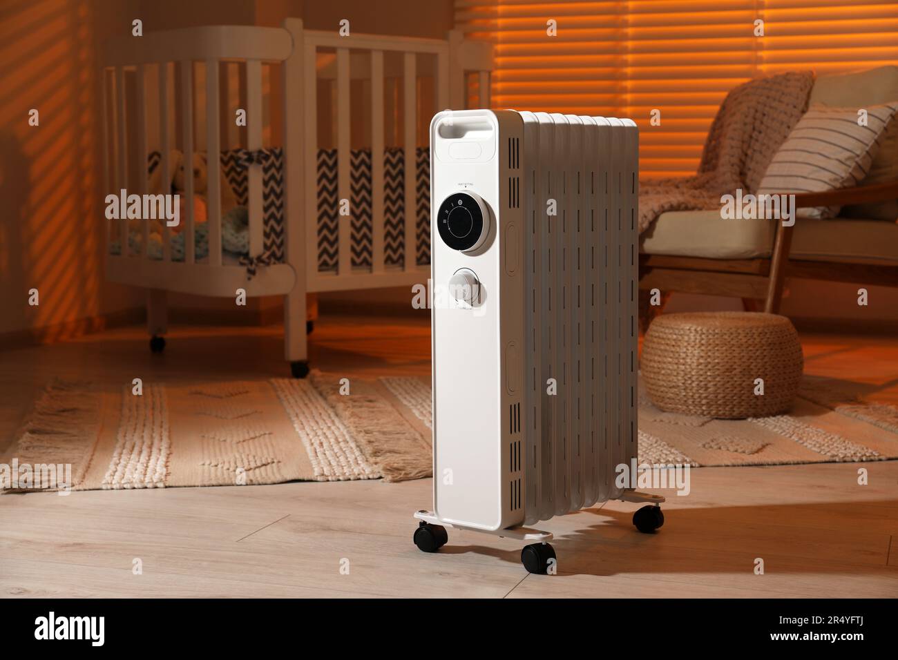 Modern portable electric heater in child room Stock Photo Alamy