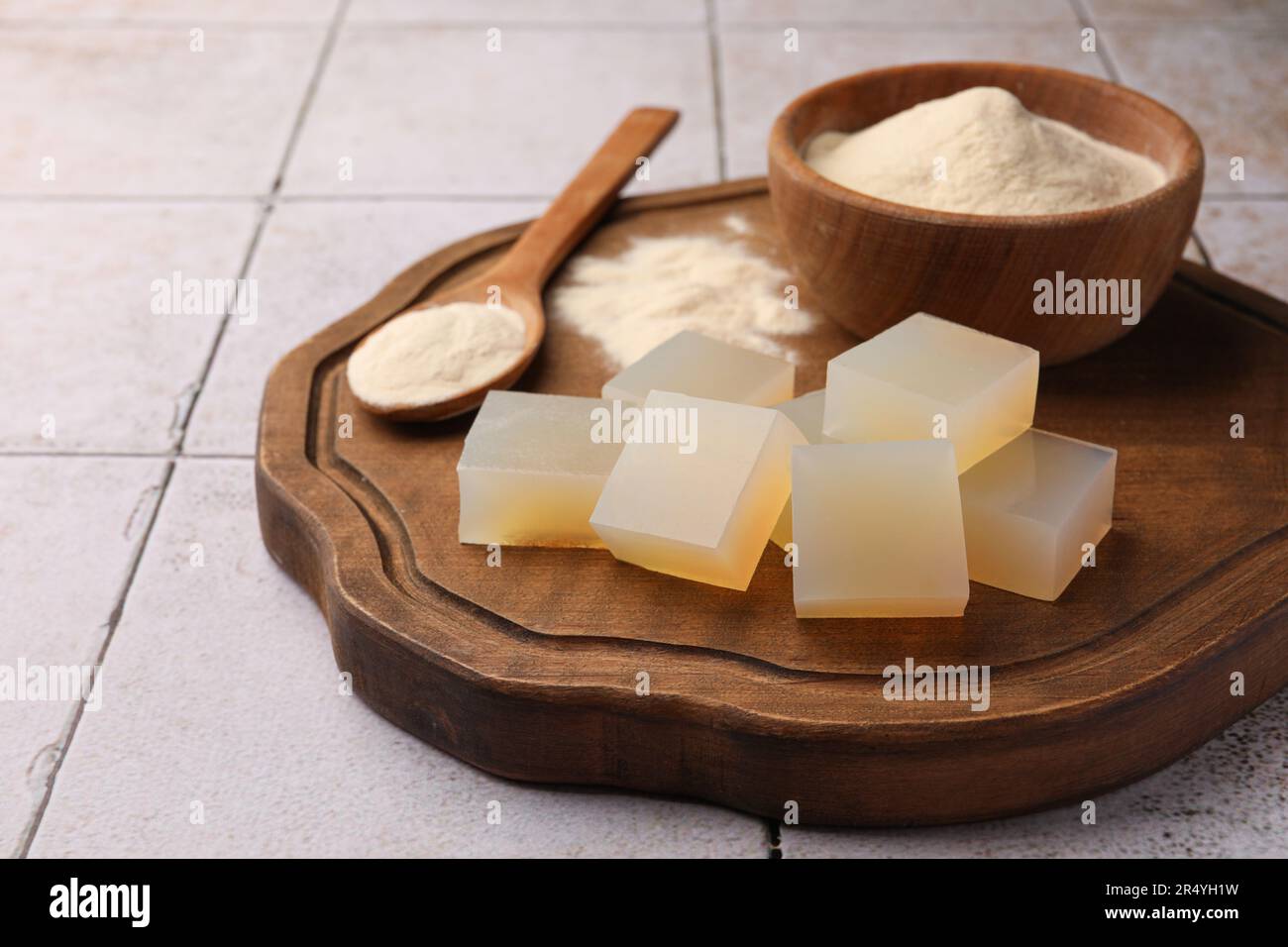 Agaragar jelly cubes and powder on tiled surface Stock Photo Alamy
