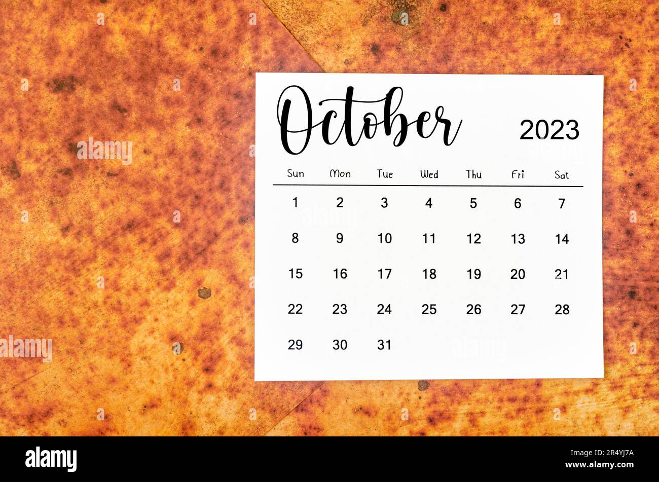 October 2023 Monthly calendar for 2023 year on red grunge background