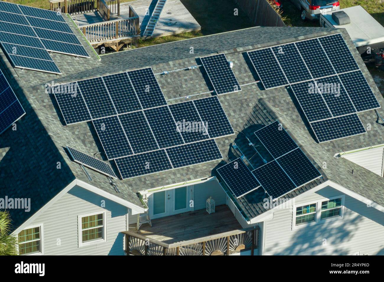 American residential house with rooftop covered with solar photovoltaic