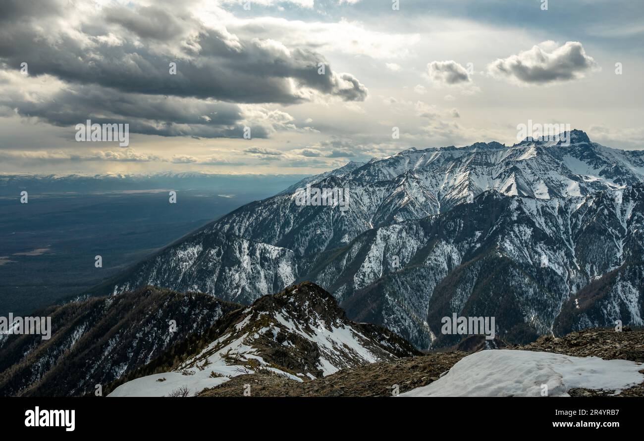 Landscape of snowcapped peaks of the rocky mountains in Sunny weather